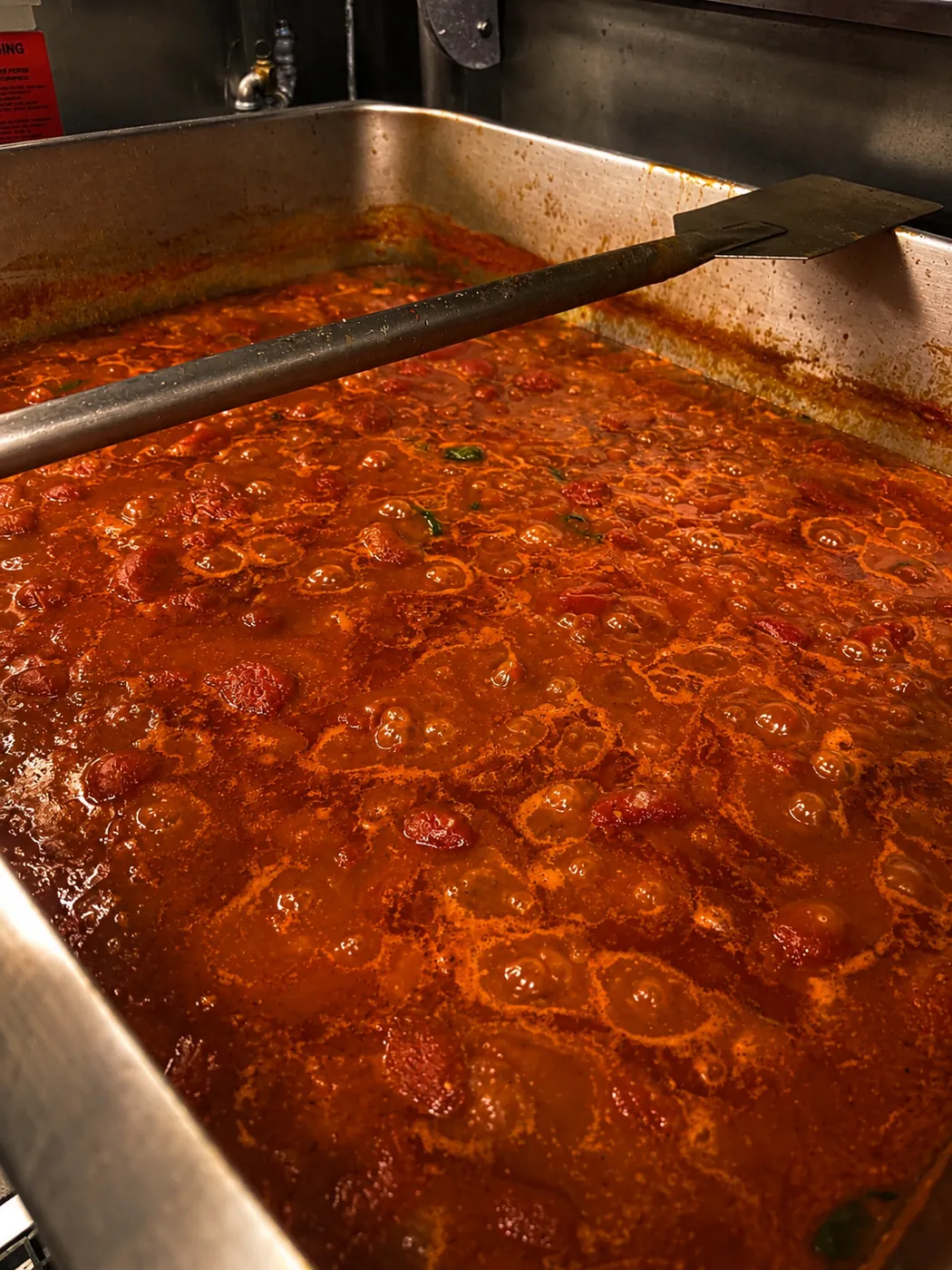 House marinara sauce simmering in the kitchen